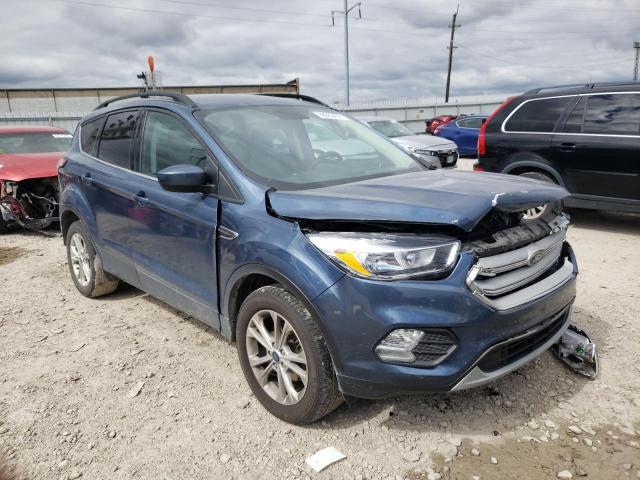 FORD ESCAPE SE 2018 with VIN 1FMCU0GD9JUC03131 - Photo from auction