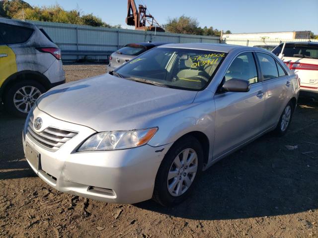 Photo 2 from auction – 2007 TOYOTA CAMRY HYBR with VIN JTNBB46K273013971