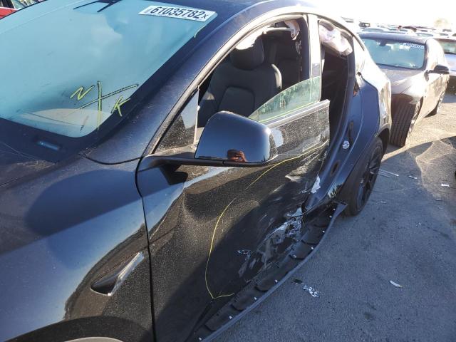 Photo 9 from auction – 2021 TESLA MODEL Y with VIN 5YJYGAEE2MF151051