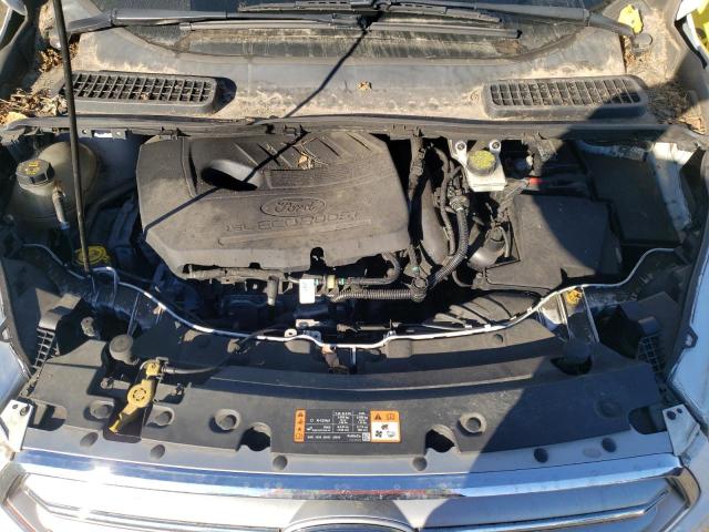 Photo 7 from auction – 2017 FORD ESCAPE SE with VIN 1FMCU9GDXHUD43557