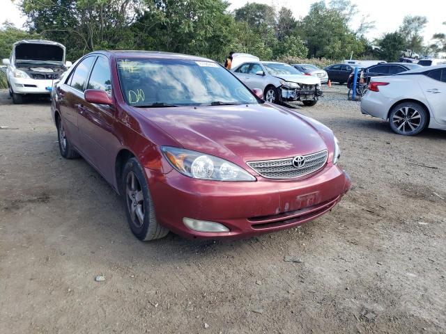 TOYOTA CAMRY LE 2002 with VIN JTDBF30K520086113 - Photo from auction