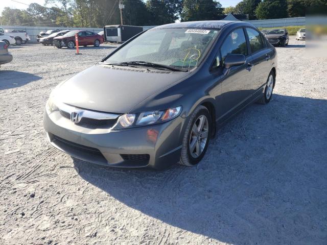 Photo 2 from auction – 2011 HONDA CIVIC LX-S with VIN 19XFA1F67BE007000
