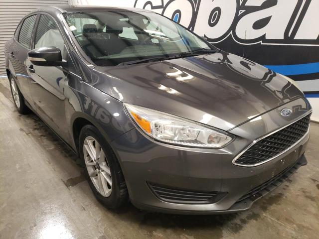FORD FOCUS SE 2016 with VIN 1FADP3F29GL312310 - Photo from auction