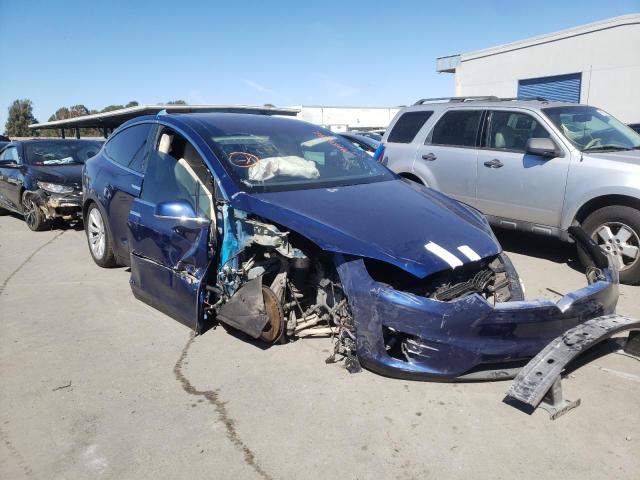 TESLA MODEL X 2018 with VIN 5YJXCAE45JF099361 - Photo from auction