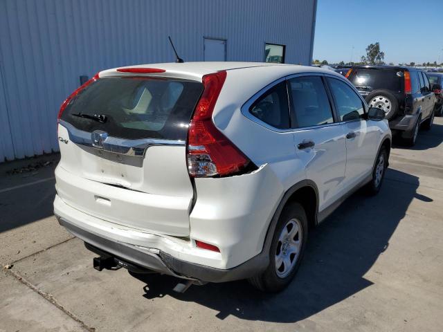 Photo 4 from auction – 2015 HONDA CR-V LX with VIN 5J6RM3H39FL025072