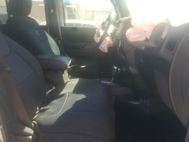 Photo 5 from auction – 2014 JEEP WRANGLER U with VIN 1C4BJWDG3EL319477