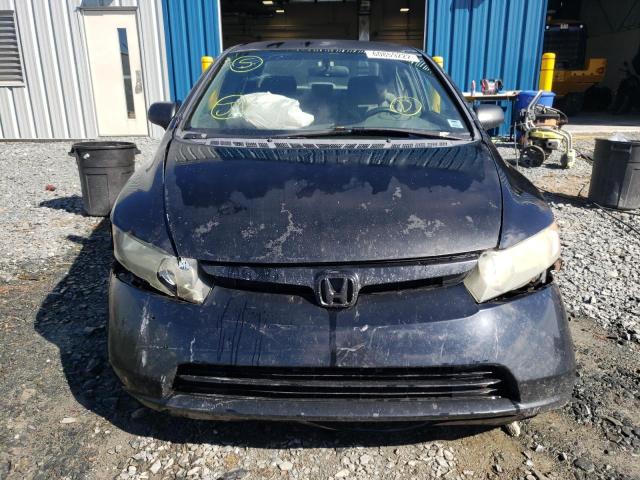 Photo 9 from auction – 2007 HONDA CIVIC DX with VIN 2HGFA15397H025129