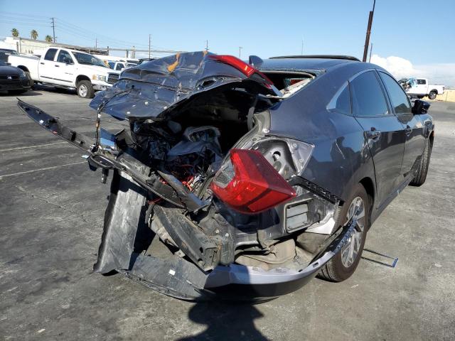 Photo 4 from auction – 2018 HONDA CIVIC EX with VIN 2HGFC2F72JH551451