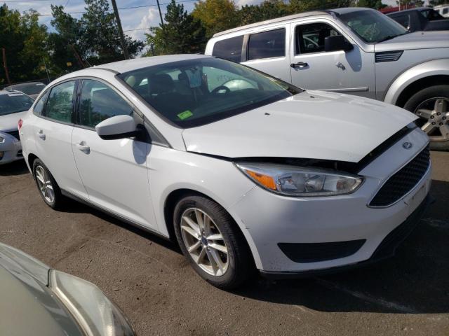 FORD FOCUS SE 2018 with VIN 1FADP3FE8JL309030 - Photo from auction