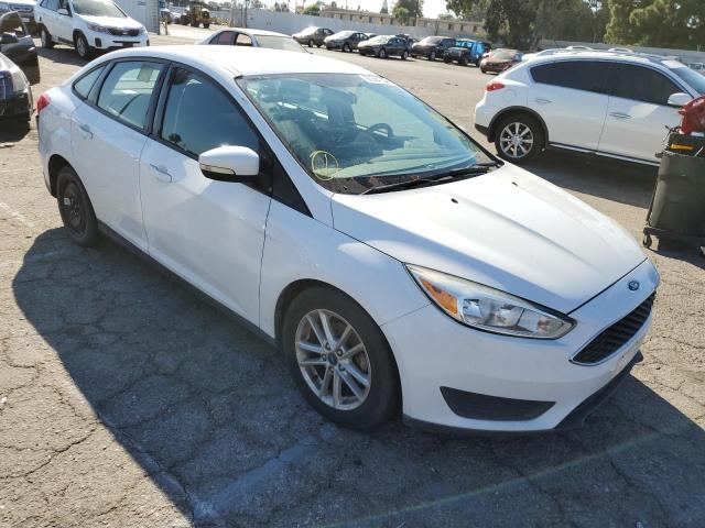 FORD FOCUS SE 2016 with VIN 1FADP3F25GL351718 - Photo from auction