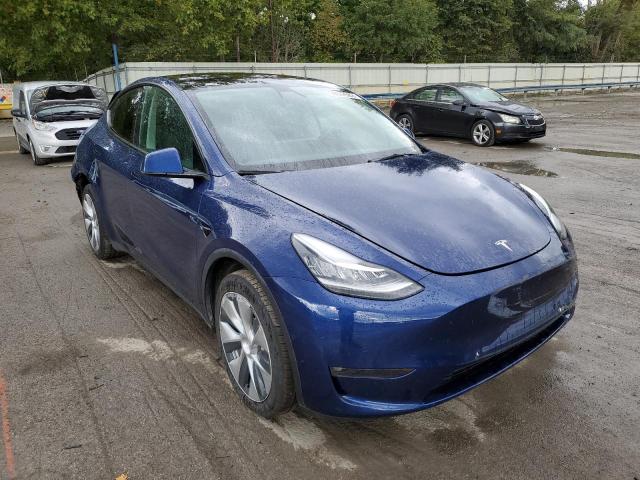 TESLA MODEL Y 2022 with VIN 7SAYGDEE9NF321203 - Photo from auction