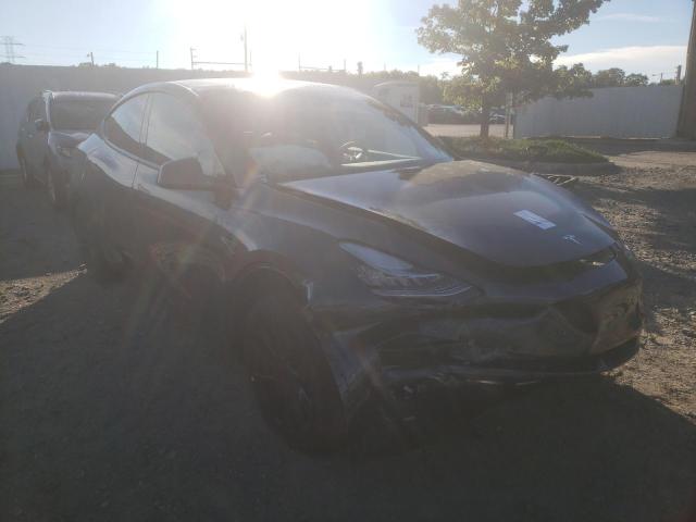 TESLA MODEL Y 2022 with VIN 7SAYGDEE7NF480236 - Photo from auction