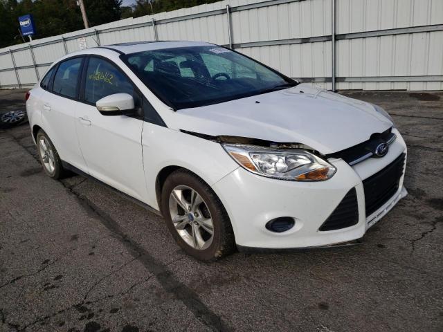 FORD FOCUS SE 2013 with VIN 1FADP3F21DL211631 - Photo from auction