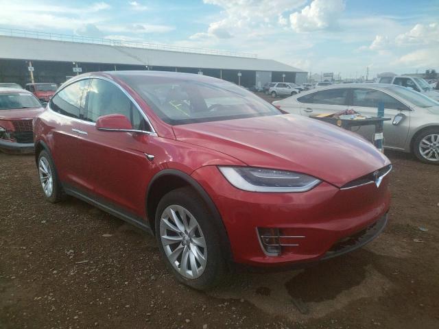 TESLA MODEL X 2018 with VIN 5YJXCDE2XJF141555 - Photo from auction