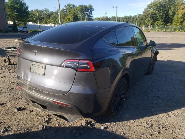 Photo 4 from auction – 2022 TESLA MODEL Y with VIN 7SAYGDEE7NF480236