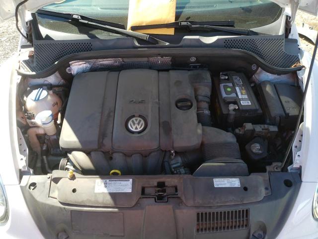 Photo 7 from auction – 2014 VOLKSWAGEN BEETLE with VIN 3VWJP7AT2EM614325