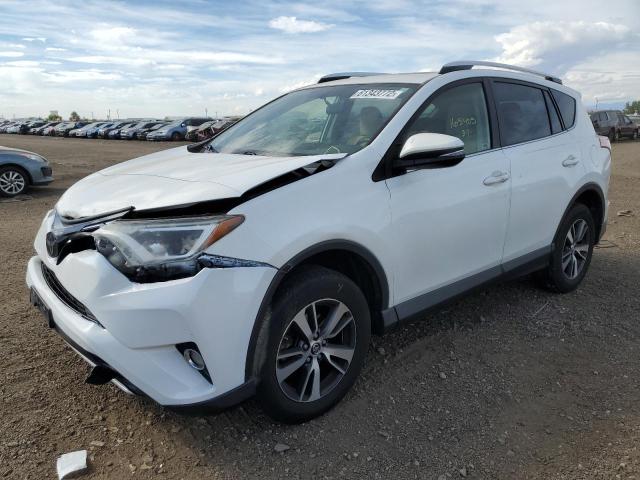 Photo 2 from auction – 2016 TOYOTA RAV4 XLE with VIN JTMRFREV3GJ079814