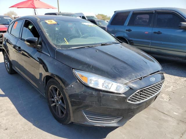 FORD FOCUS SE 2016 with VIN 1FADP3K23GL244883 - Photo from auction
