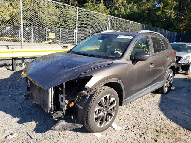 Photo 2 from auction – 2016 MAZDA CX-5 GT with VIN JM3KE4DYXG0740769