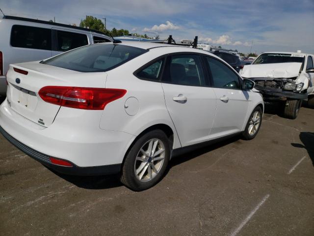 Photo 4 from auction – 2018 FORD FOCUS SE with VIN 1FADP3FE8JL309030