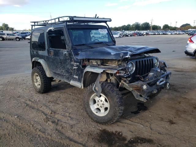 JEEP WRANGLER / 2000 with VIN 1J4FA49S6YP761227 - Photo from auction