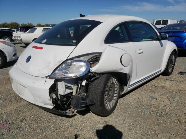 Photo 4 from auction – 2014 VOLKSWAGEN BEETLE with VIN 3VWJP7AT2EM614325