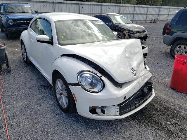 VOLKSWAGEN BEETLE 2014 with VIN 3VWRL7AT0EM618047 - Photo from auction