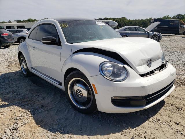 VOLKSWAGEN BEETLE 2013 with VIN 3VWJX7AT4DM606399 - Photo from auction