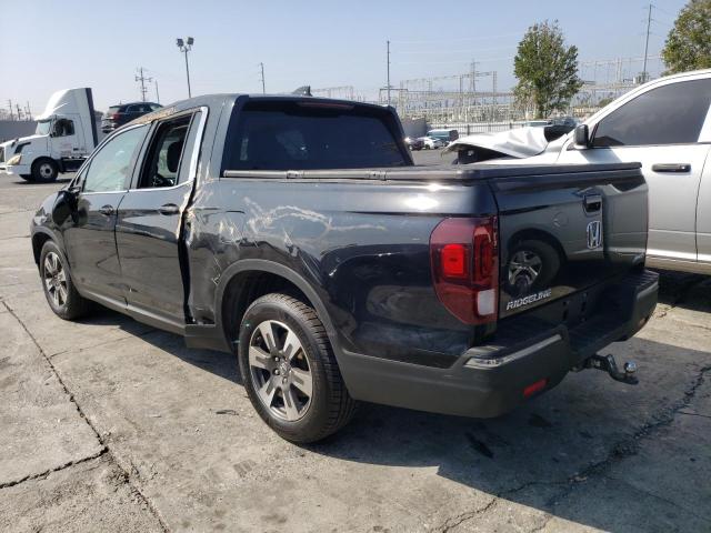 Photo 3 from auction – 2018 HONDA RIDGELINE with VIN 5FPYK3F67JB011341