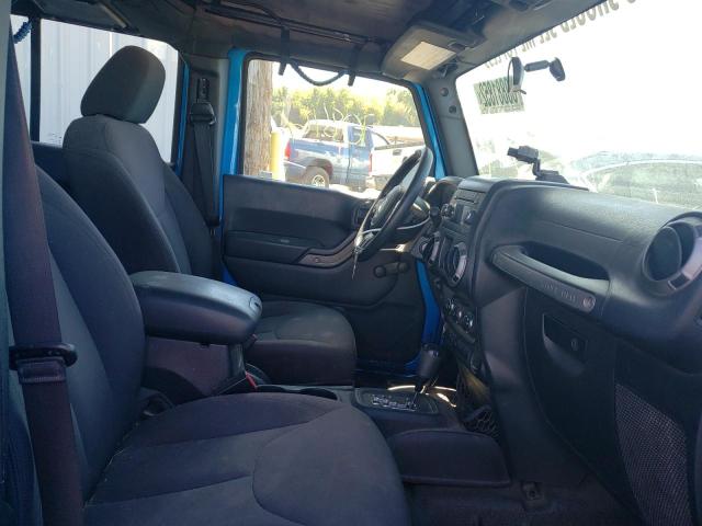 Photo 5 from auction – 2015 JEEP WRANGLER U with VIN 1C4BJWDG2FL688672