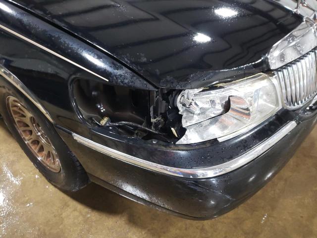 Photo 9 from auction – 2002 LINCOLN TOWN CAR C with VIN 1LNHM85W32Y670869