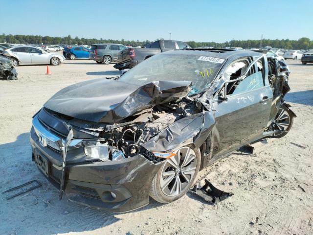 Photo 2 from auction – 2016 HONDA CIVIC EX with VIN 2HGFC1F36GH631318