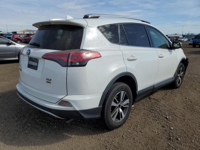 Photo 4 from auction – 2016 TOYOTA RAV4 XLE with VIN JTMRFREV3GJ079814