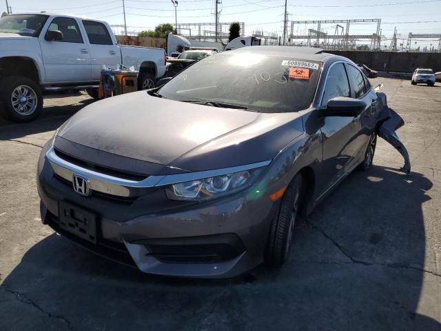 Photo 2 from auction – 2018 HONDA CIVIC EX with VIN 2HGFC2F72JH551451