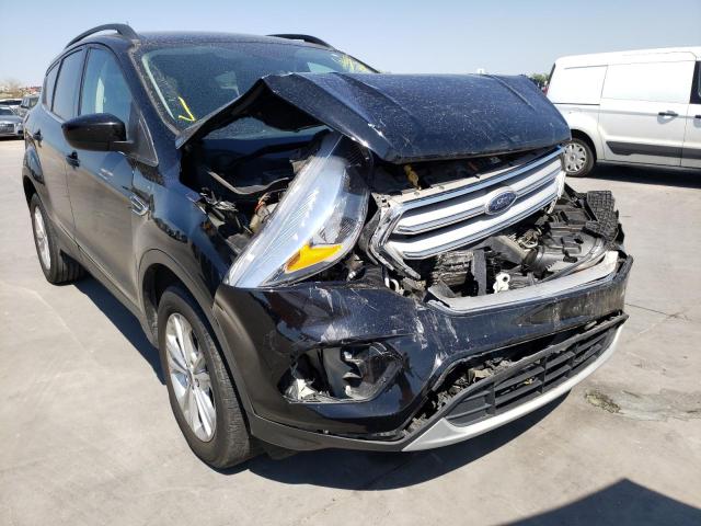 FORD ESCAPE SE 2018 with VIN 1FMCU0GD0JUC46644 - Photo from auction