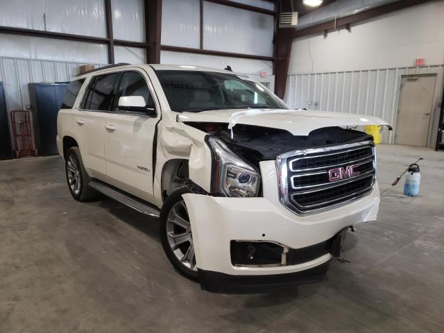 GMC YUKON SLT 2015 with VIN 1GKS2BKC5FR106524 - Photo from auction