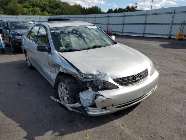 TOYOTA CAMRY LE 2004 with VIN 4T1BF32K64U578086 - Photo from auction