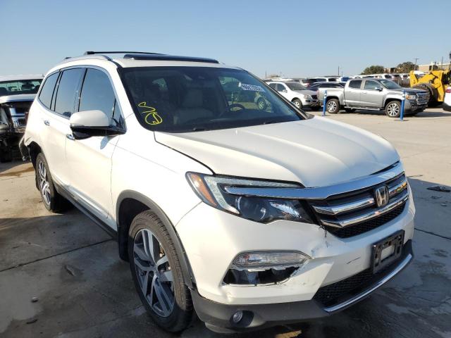 HONDA PILOT TOUR 2017 with VIN 5FNYF6H97HB026213 - Photo from auction