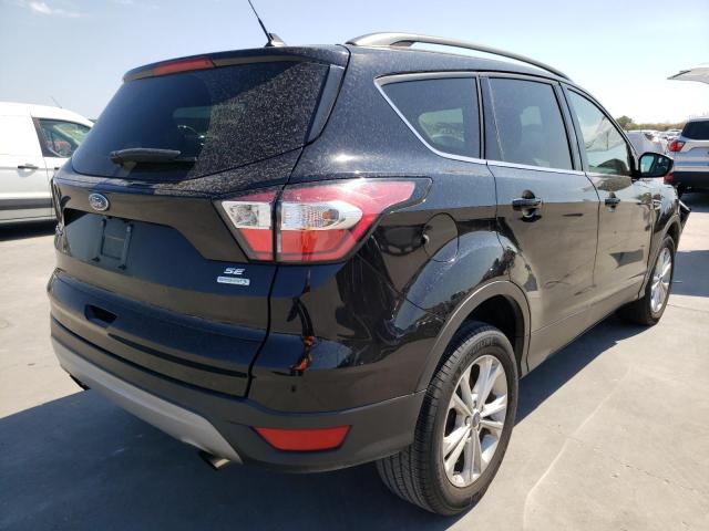 Photo 4 from auction – 2018 FORD ESCAPE SE with VIN 1FMCU0GD0JUC46644