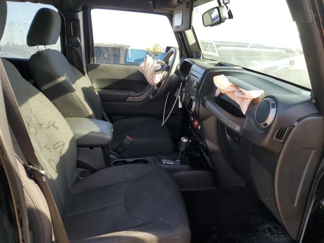 Photo 5 from auction – 2014 JEEP WRANGLER U with VIN 1C4BJWDG9EL155068