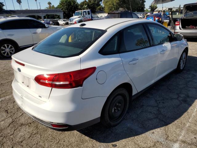 Photo 4 from auction – 2016 FORD FOCUS SE with VIN 1FADP3F25GL351718