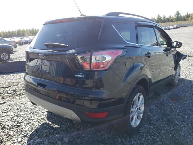 Photo 4 from auction – 2017 FORD ESCAPE SE with VIN 1FMCU9GD7HUB07383