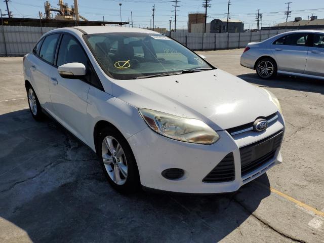 FORD FOCUS SE 2014 with VIN 1FADP3F20EL391217 - Photo from auction