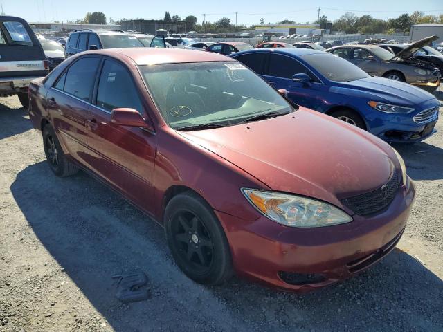 Photo 1 from auction – 2002 TOYOTA CAMRY LE with VIN JTDBE32K820046611