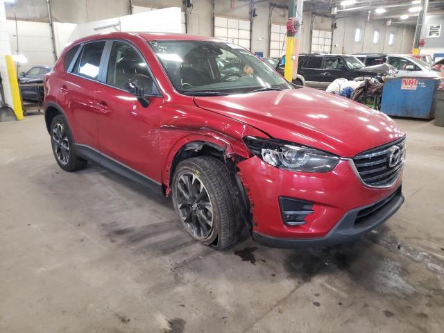 MAZDA CX-5 GT 2016 with VIN JM3KE4DY4G0874211 - Photo from auction