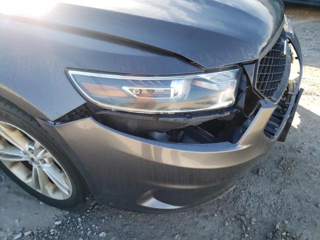 Photo 9 from auction – 2015 FORD TAURUS POL with VIN 1FAHP2MK1FG129036