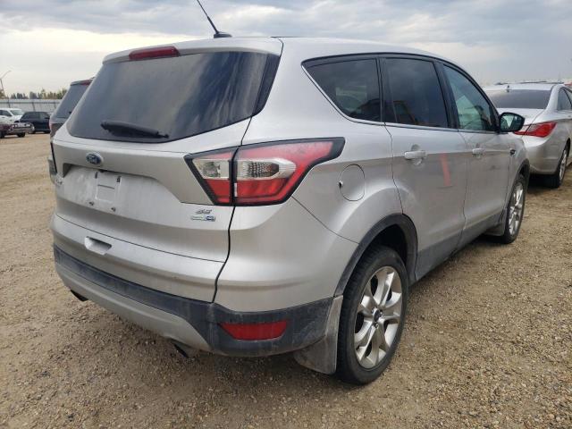 Photo 4 from auction – 2017 FORD ESCAPE SE with VIN 1FMCU9GD2HUB11020