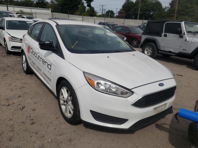 FORD FOCUS SE 2016 with VIN 1FADP3K20GL240323 - Photo from auction