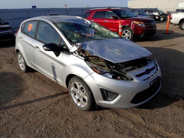 FORD FIESTA SES 2012 with VIN 3FADP4FJ1CM140571 - Photo from auction