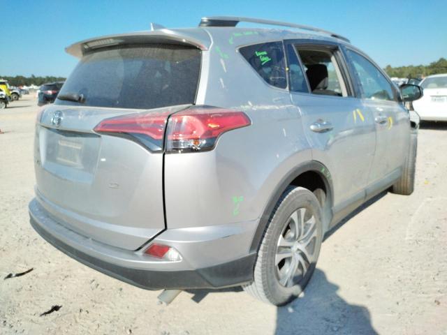 Photo 4 from auction – 2018 TOYOTA RAV4 LE with VIN 2T3ZFREV4JW518916